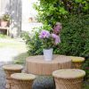 Table et tabourets de jardin en rotin